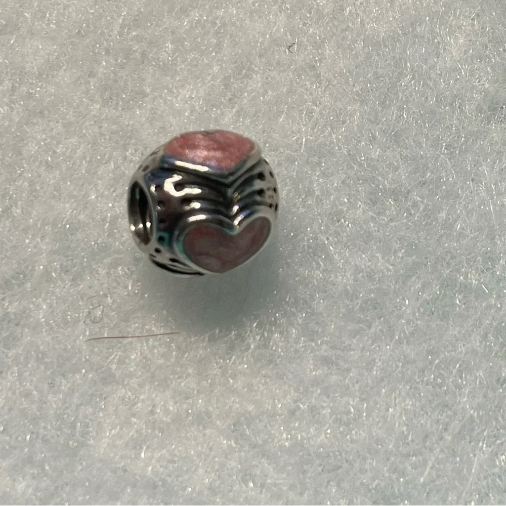 EUC Pandora Rose Enamel Hearts Charm Retired. In excellent condition.